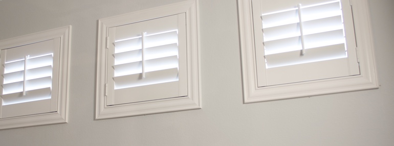 Square Windows in a Phoenix Garage with Plantation Shutters
